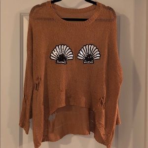 Destroyed seashell sweater